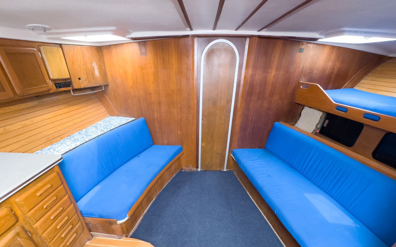 Cushioned interior lounge of the Tocayos 38