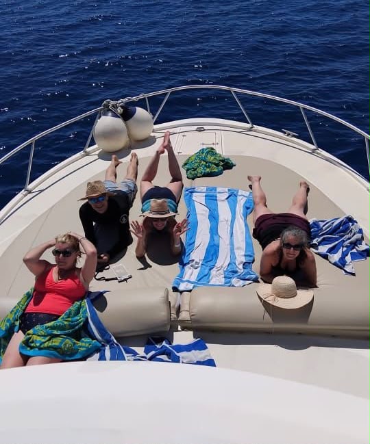 Family fishing at Puerto Aventuras, Riviera Maya, on the Tocayos 38