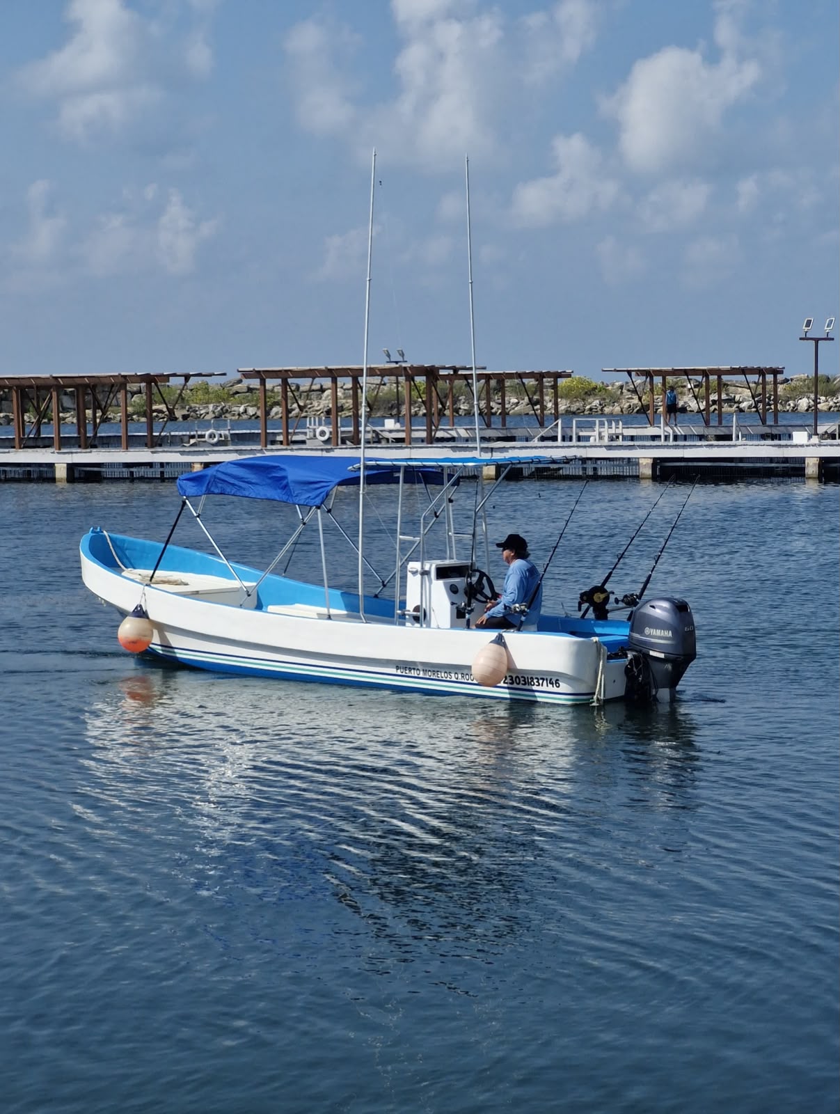 25 ft panga fishing charter leaving Marina El CID in Puerto Morelos